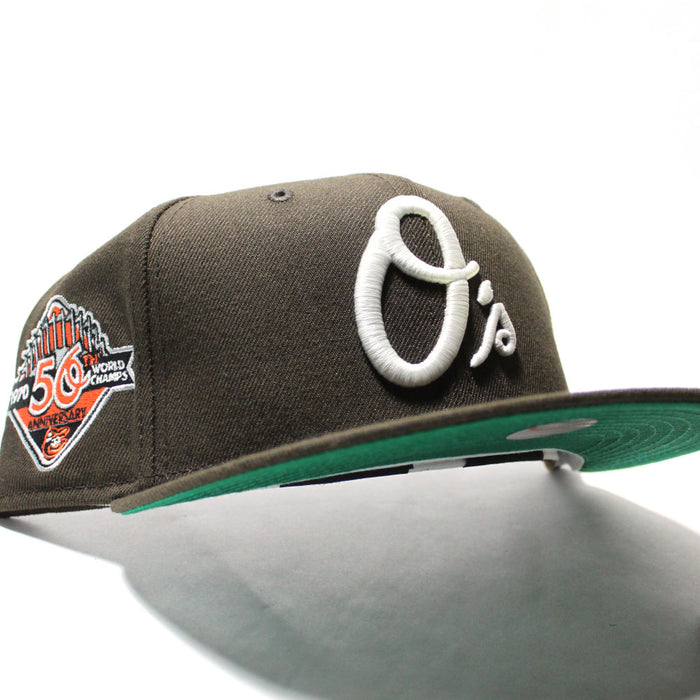 Baltimore Orioles 50TH Anniversary World Series Champs New Era 59Fifty Fitted Hat (Glow in the Dark Walnut Green Under Brim)