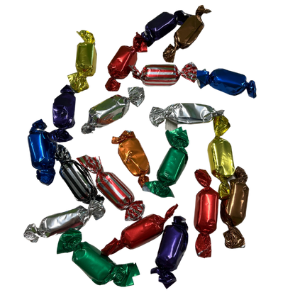 View of Baker's Candies Meltaway Chocolates scattered to show product on white background.