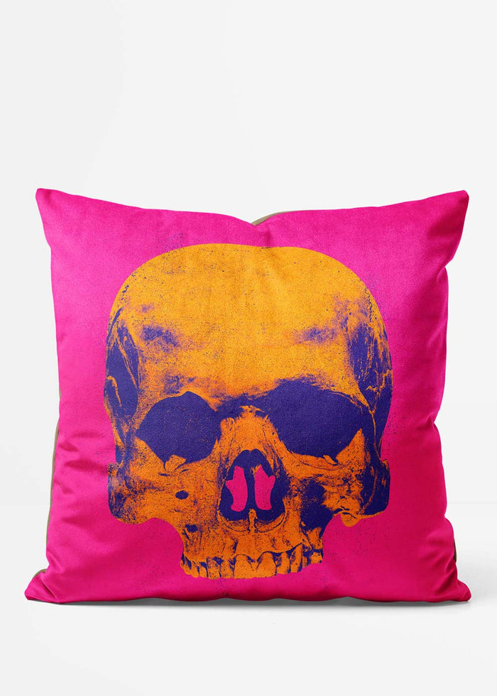 Popart Warhol Style Orange Skull Cushion, front view in pink