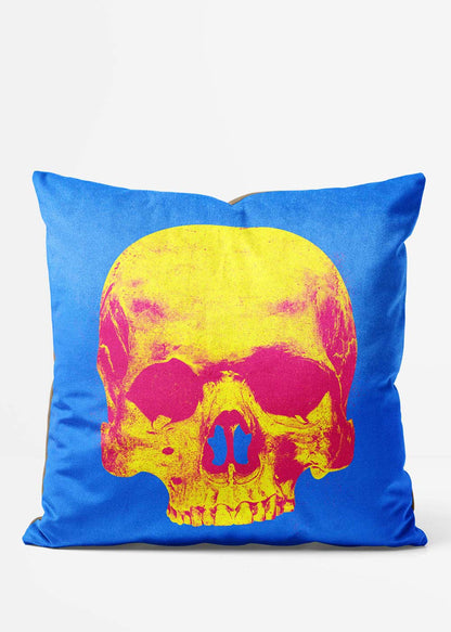 Popart Warhol Style Yellow Skull Cushion, front view in blue