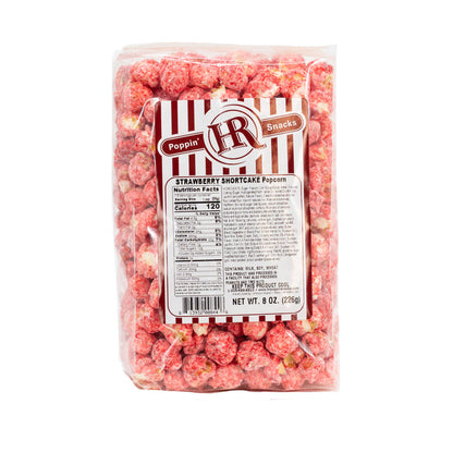 A pack of HR Poppin' Snacks Strawberry Shortcake flavored popcorn in an 8 oz bag.