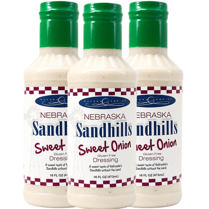 Three bottles of Nebraska Sandhills Sweet Onion dressing on a white background